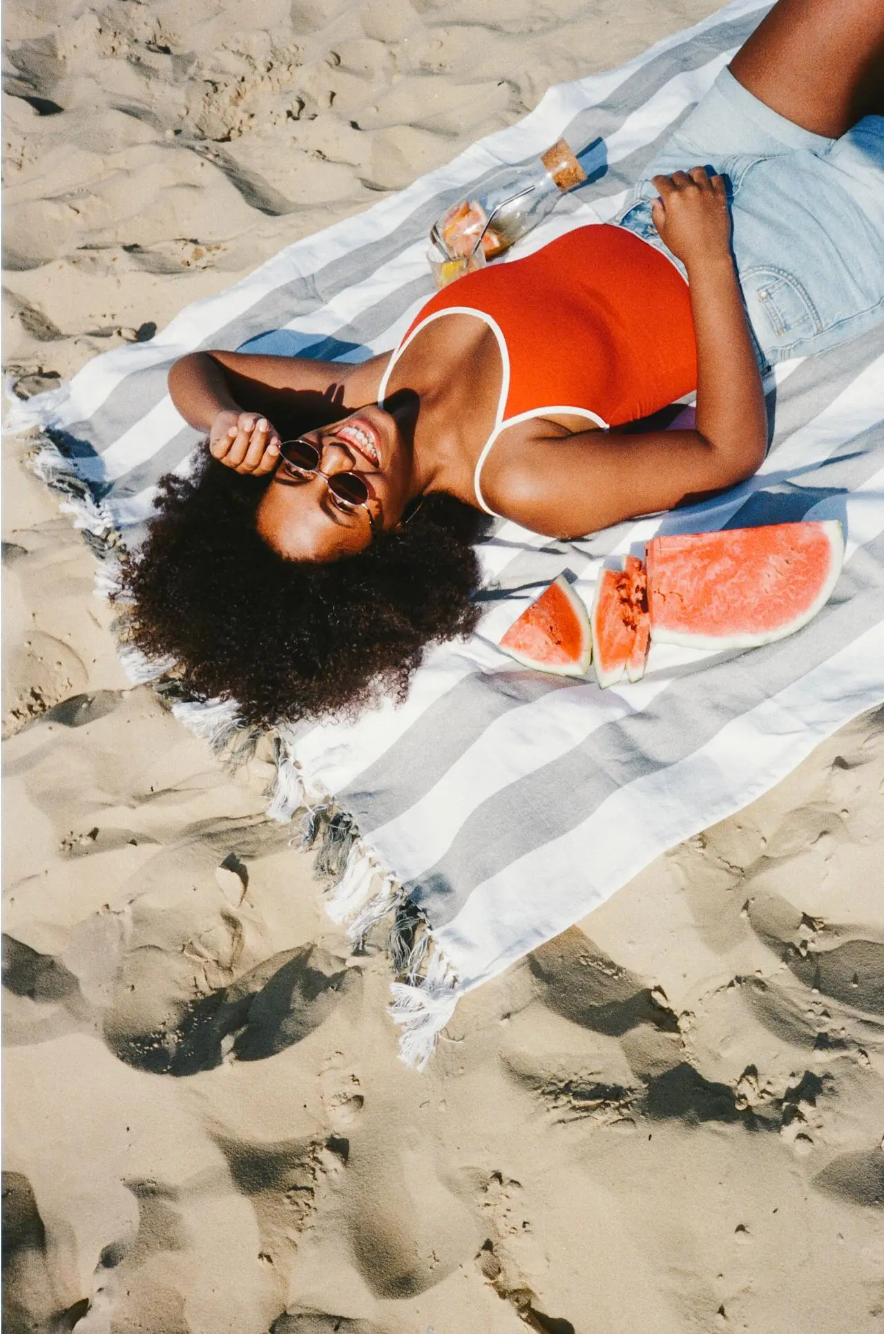 A women sunbathing on beach