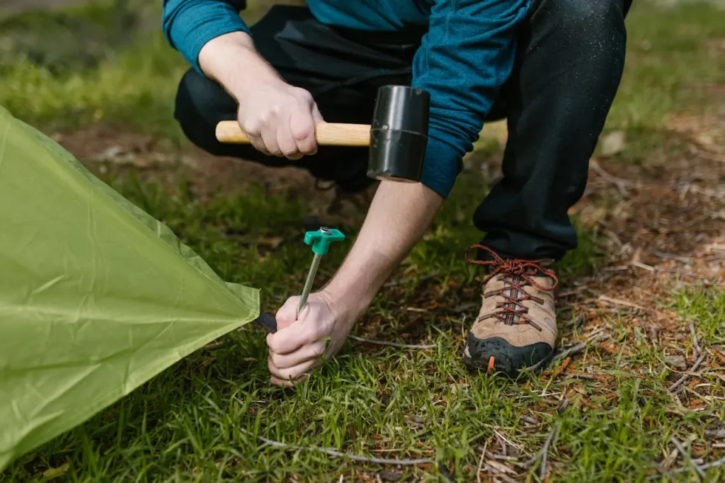 final adjustment on setting up a tent